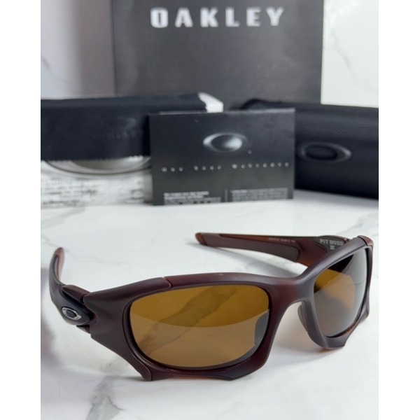Lentes OAKLEY — Ref. LF-L235-0435 con el packaging mostrado en la fotografía