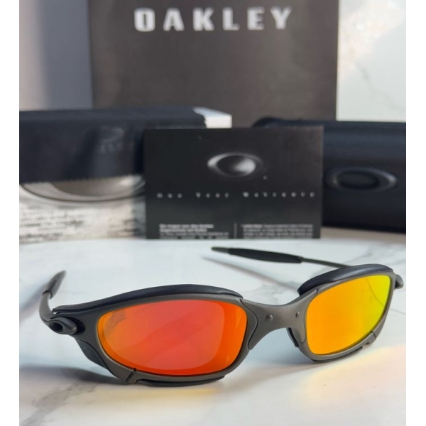 Lentes OAKLEY — Ref. LF-L235-0438 con el packaging mostrado en la fotografía