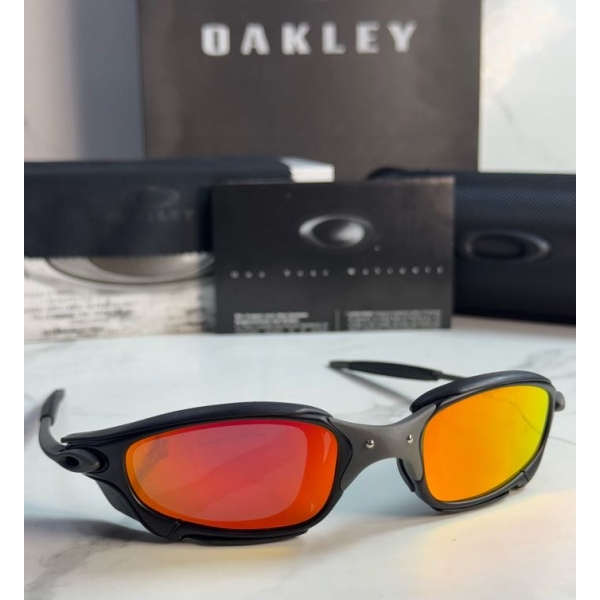 Lentes OAKLEY — Ref. LF-L235-0441 con el packaging mostrado en la fotografía