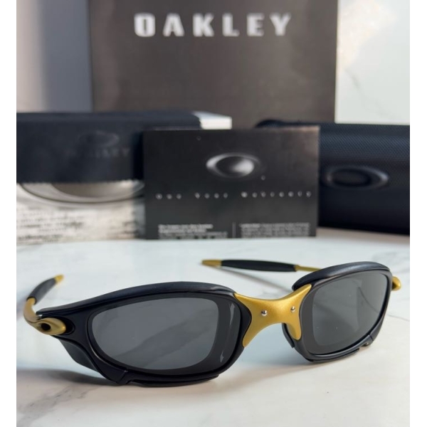Lentes OAKLEY — Ref. LF-L235-0442 con el packaging mostrado en la fotografía
