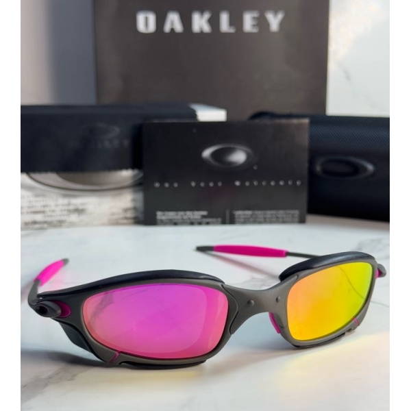 Lentes OAKLEY — Ref. LF-L235-0444 con el packaging mostrado en la fotografía