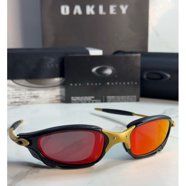 Lentes OAKLEY — Ref. LF-L235-0445 con el packaging mostrado en la fotografía