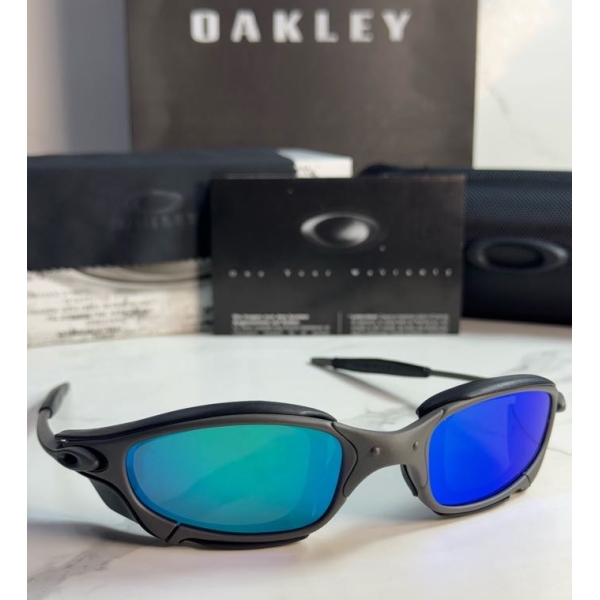 Lentes OAKLEY — Ref. LF-L235-0450 con el packaging mostrado en la fotografía