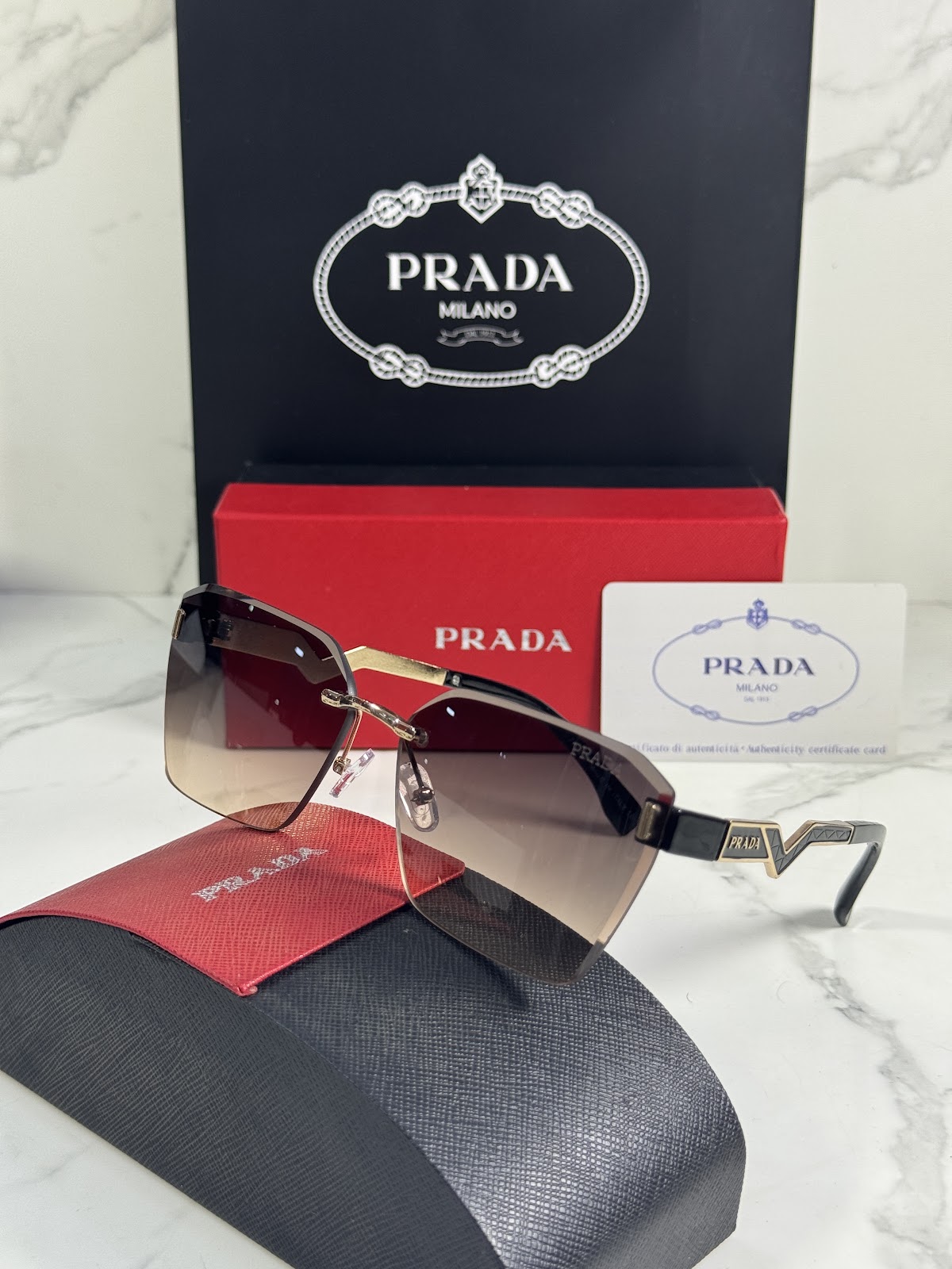 Lentes PRADA — Ref. LF-L227-0006 con el packaging mostrado en la fotografía