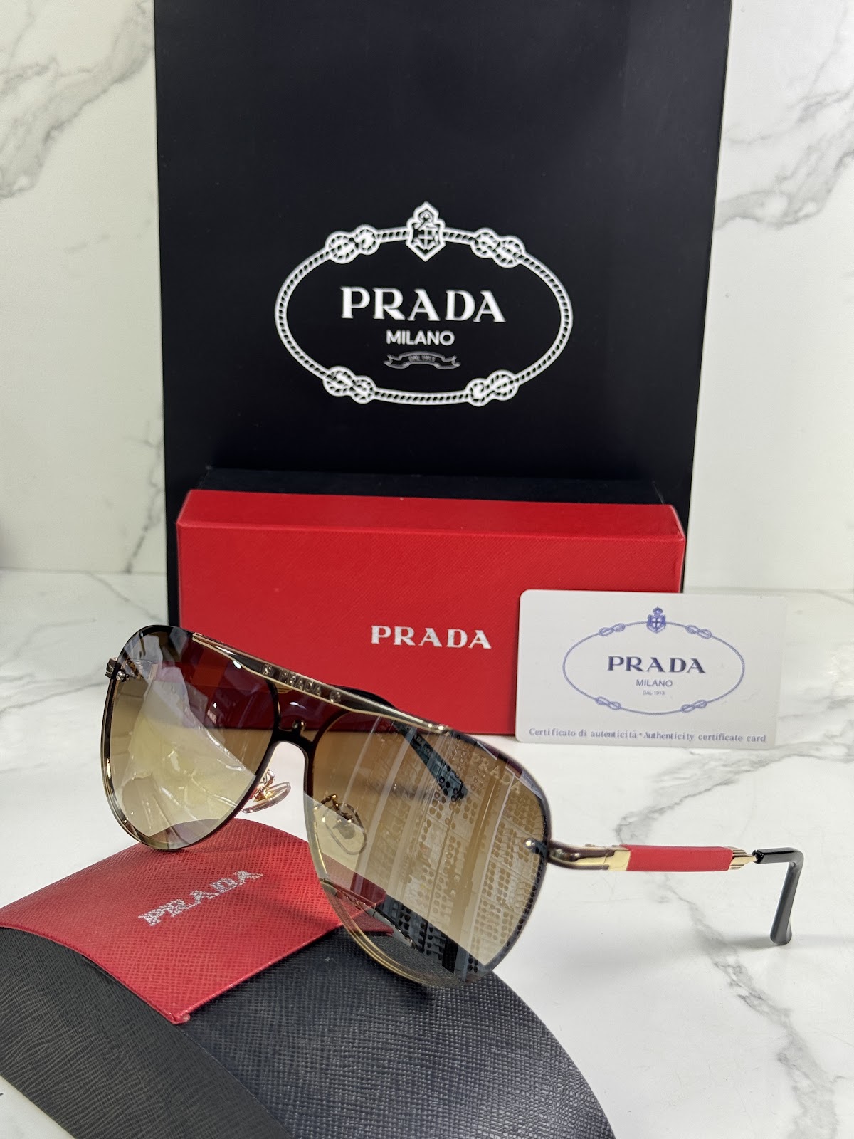 Lentes PRADA — Ref. LF-L227-0009 con el packaging mostrado en la fotografía