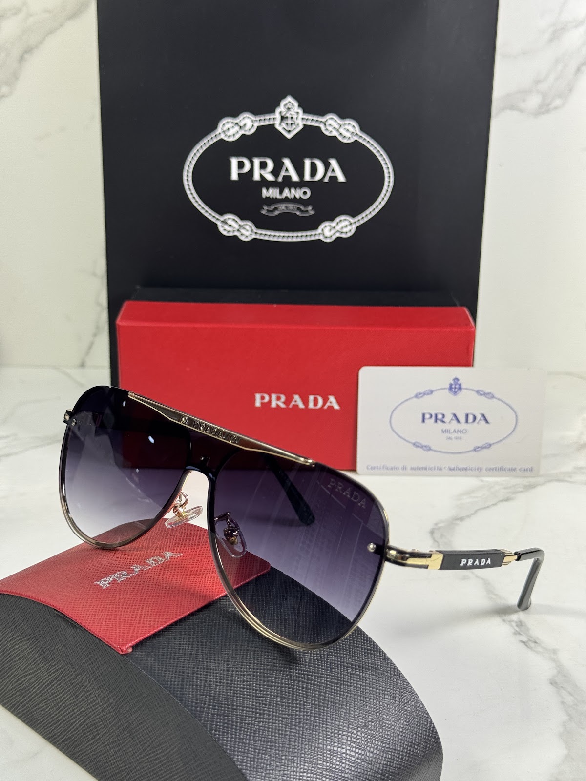 Lentes PRADA — Ref. LF-L227-0011 con el packaging mostrado en la fotografía