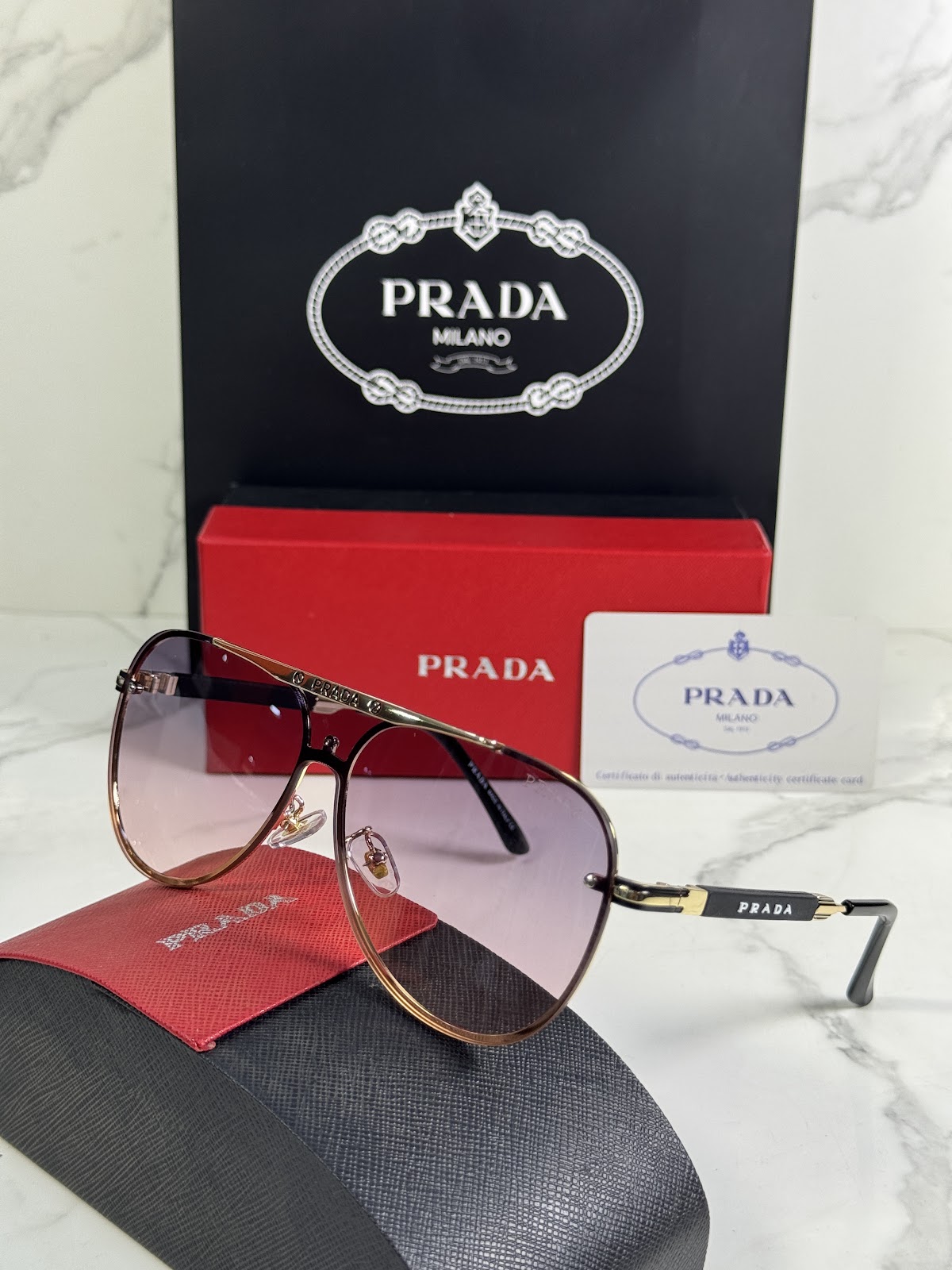 Lentes PRADA — Ref. LF-L227-0014 con el packaging mostrado en la fotografía