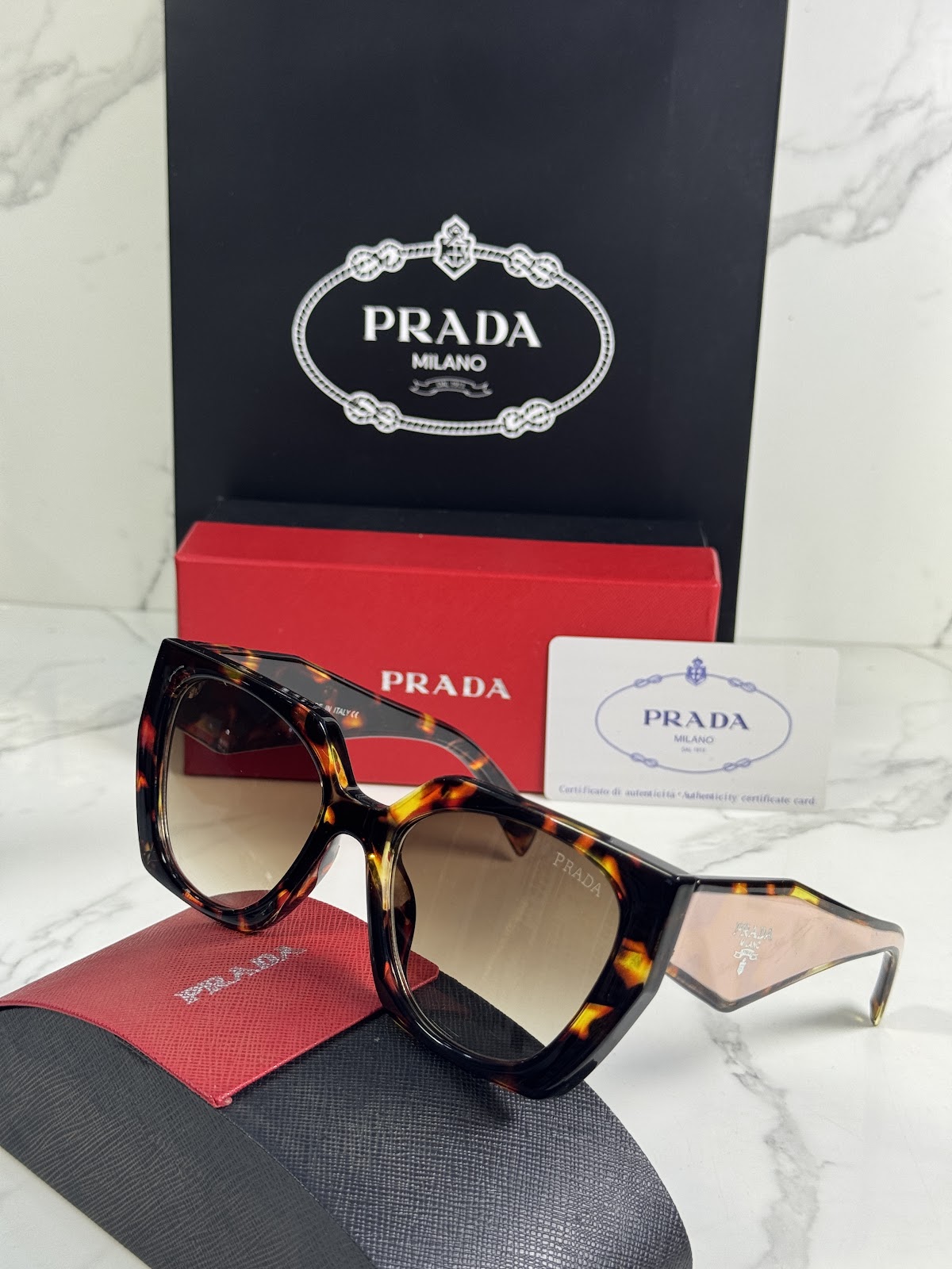 Lentes PRADA — Ref. LF-L227-0019 con el packaging mostrado en la fotografía