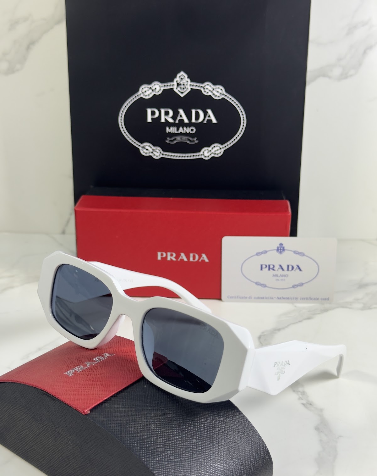 Lentes PRADA — Ref. LF-L227-0022 con el packaging mostrado en la fotografía