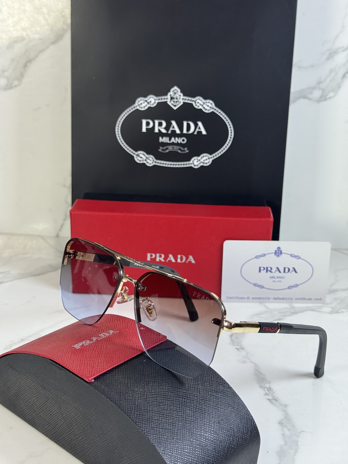 Lentes PRADA — Ref. LF-L227-0030 con el packaging mostrado en la fotografía
