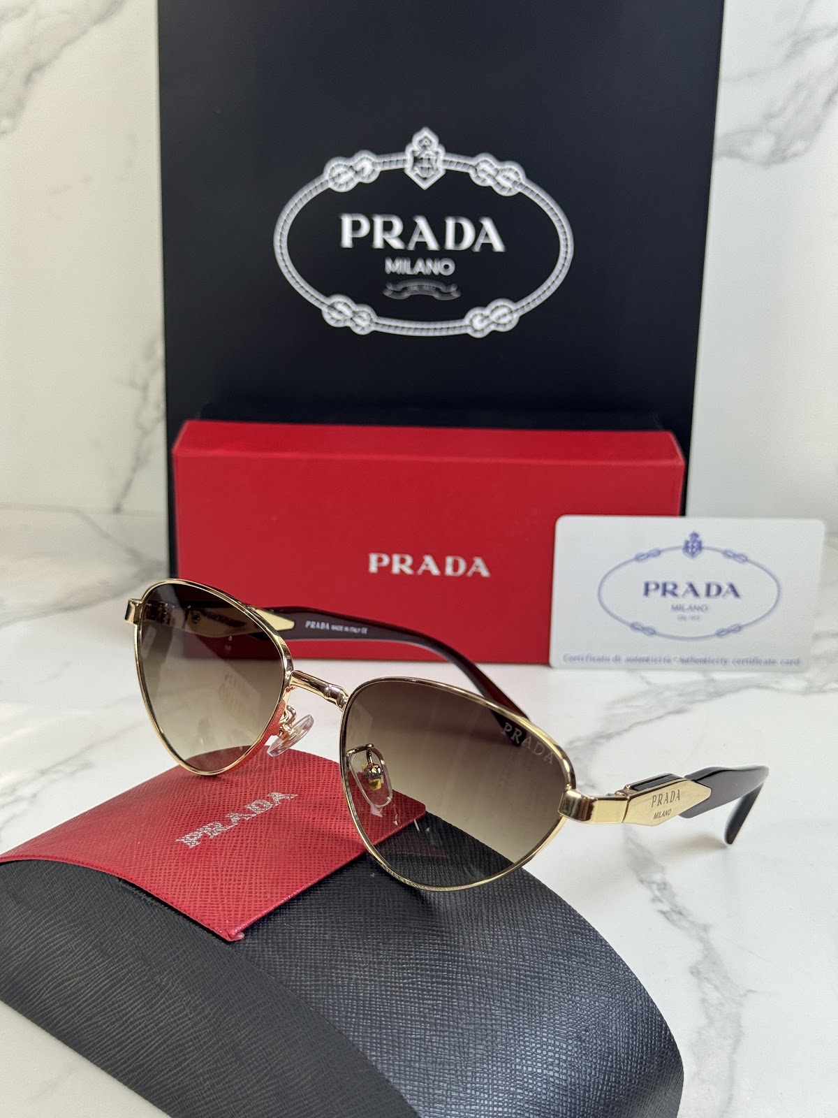 Lentes PRADA — Ref. LF-L227-0055 con el packaging mostrado en la fotografía