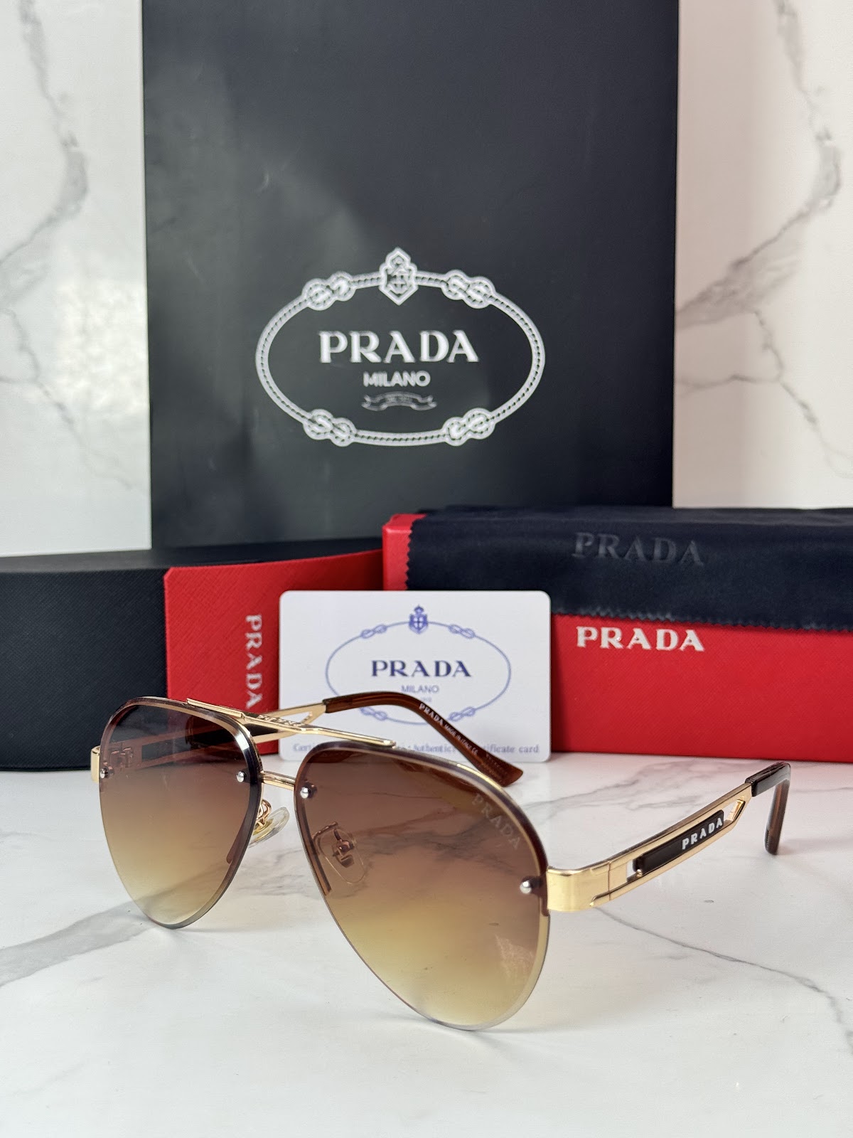 Lentes PRADA — Ref. LF-L227-0066 con el packaging mostrado en la fotografía