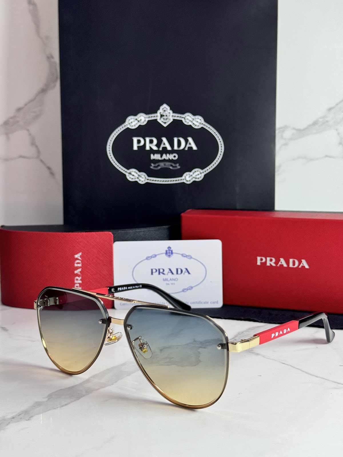 Lentes PRADA — Ref. LF-L227-0076 con el packaging mostrado en la fotografía