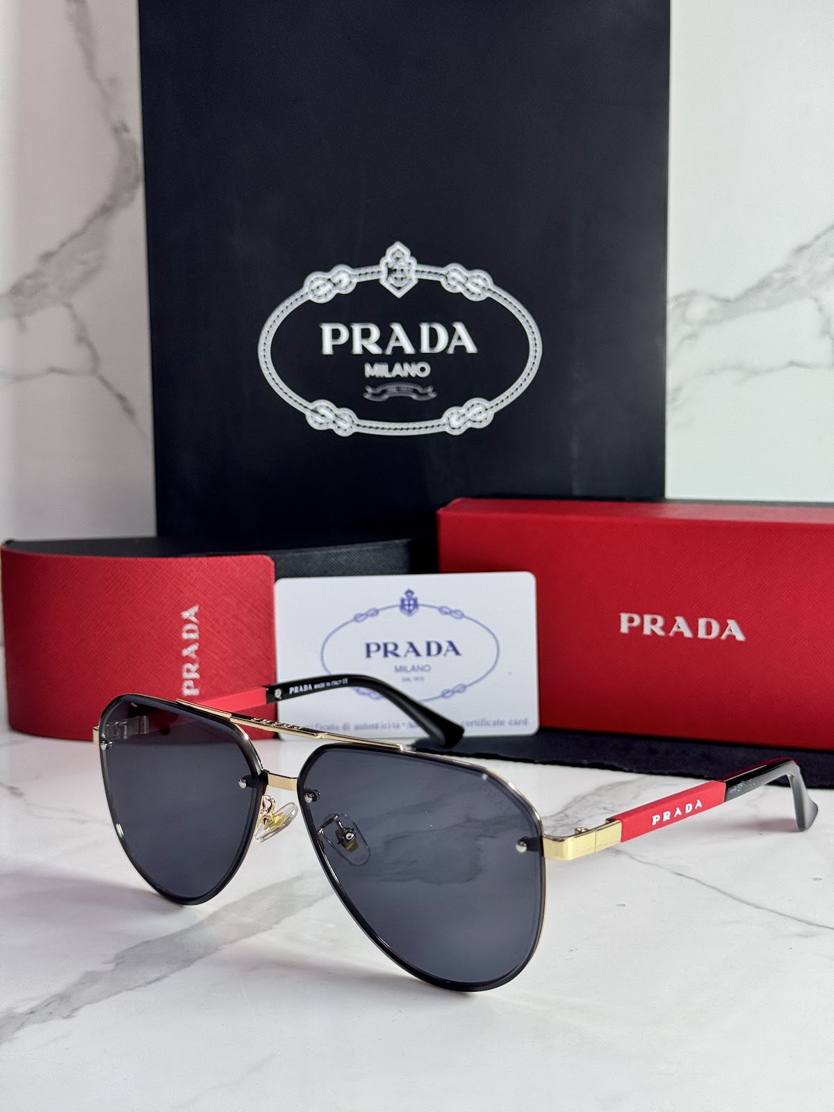 Lentes PRADA — Ref. LF-L227-0077 con el packaging mostrado en la fotografía