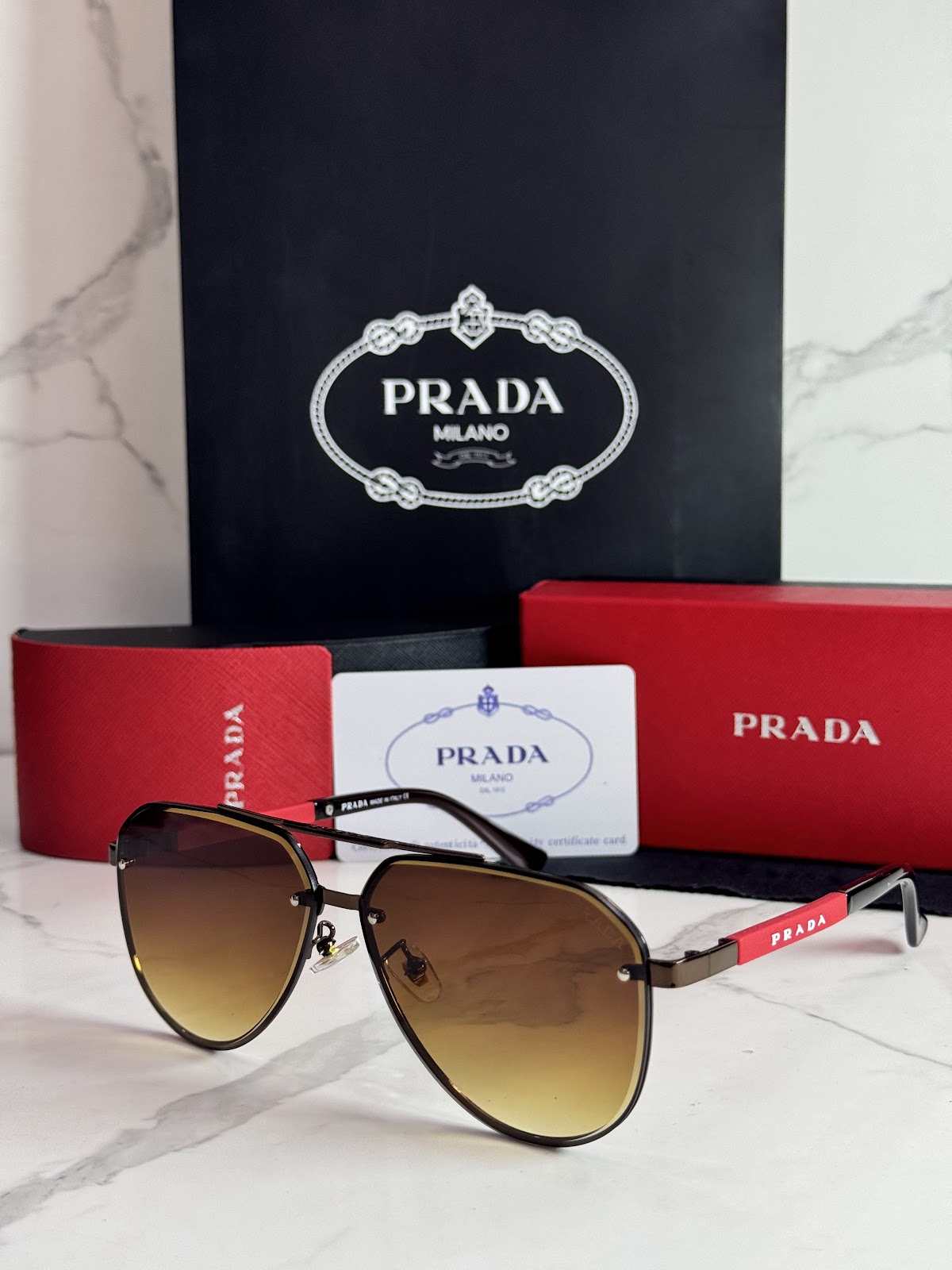 Lentes PRADA — Ref. LF-L227-0078 con el packaging mostrado en la fotografía