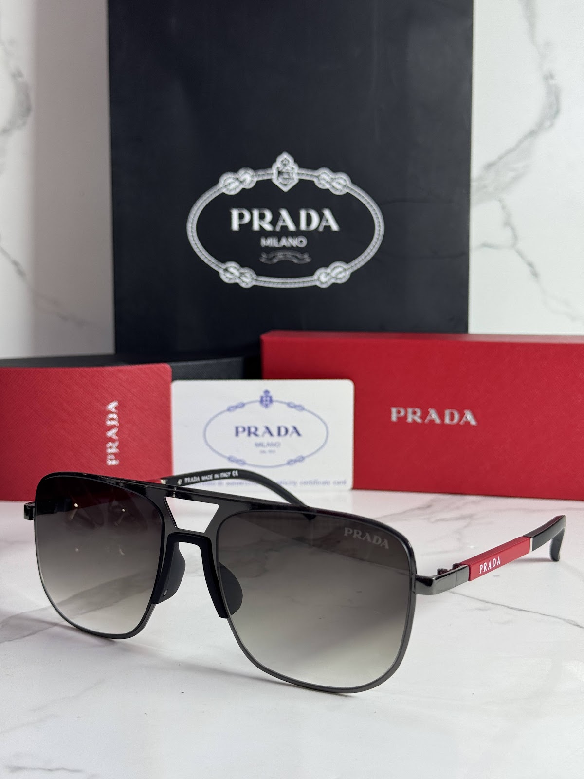 Lentes PRADA — Ref. LF-L227-0084 con el packaging mostrado en la fotografía