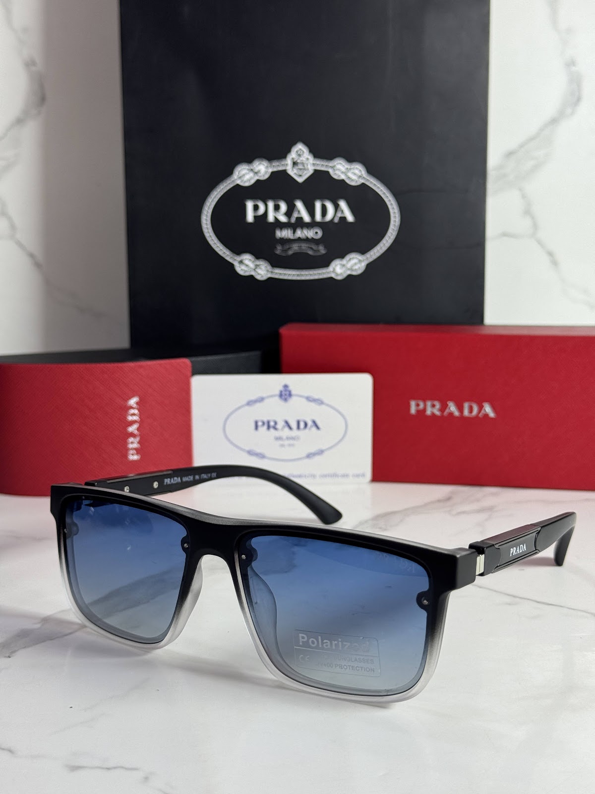 Lentes PRADA — Ref. LF-L227-0092 con el packaging mostrado en la fotografía