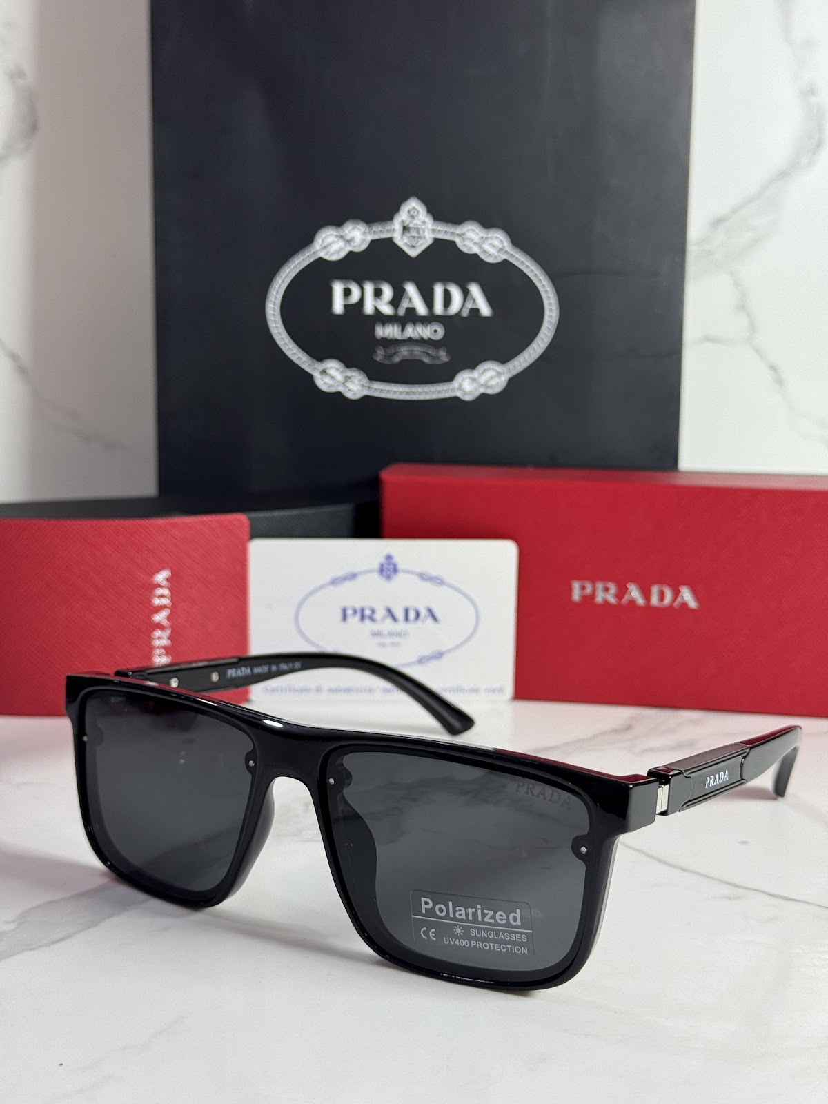 Lentes PRADA — Ref. LF-L227-0095 con el packaging mostrado en la fotografía