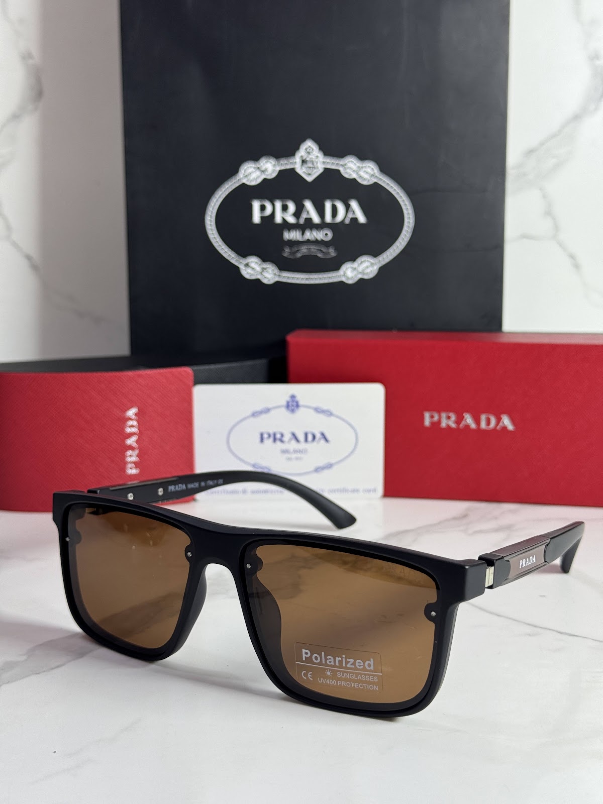 Lentes PRADA — Ref. LF-L227-0096 con el packaging mostrado en la fotografía