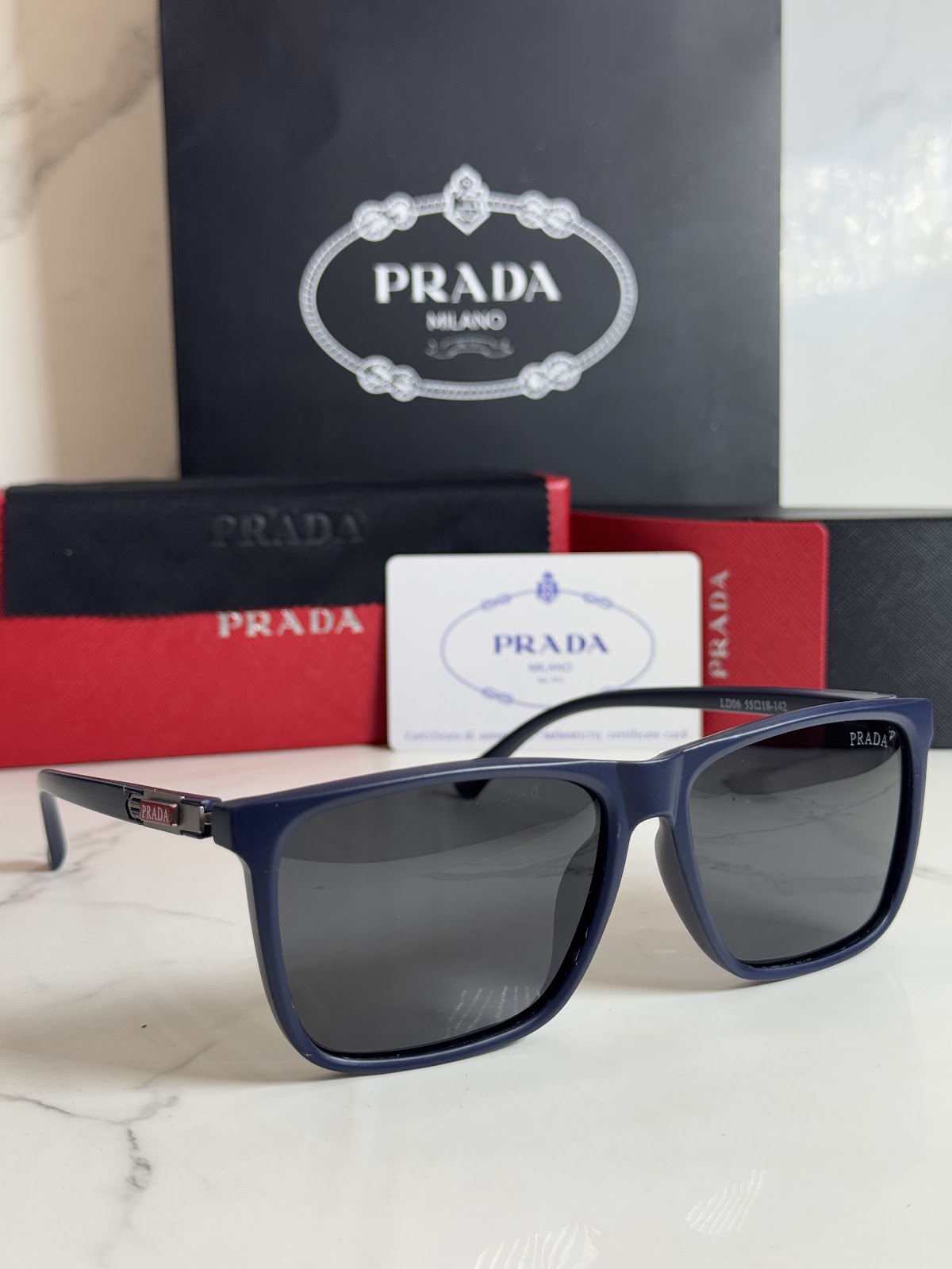 Lentes PRADA — Ref. LF-L227-0109 con el packaging mostrado en la fotografía