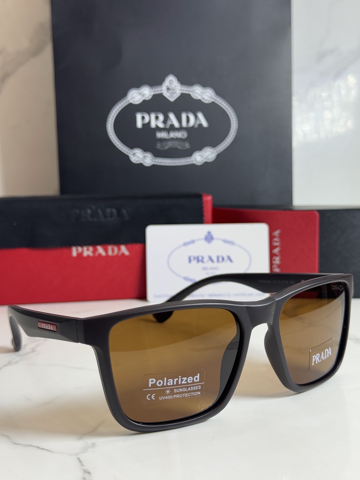 Lentes PRADA — Ref. LF-L227-0114 con el packaging mostrado en la fotografía