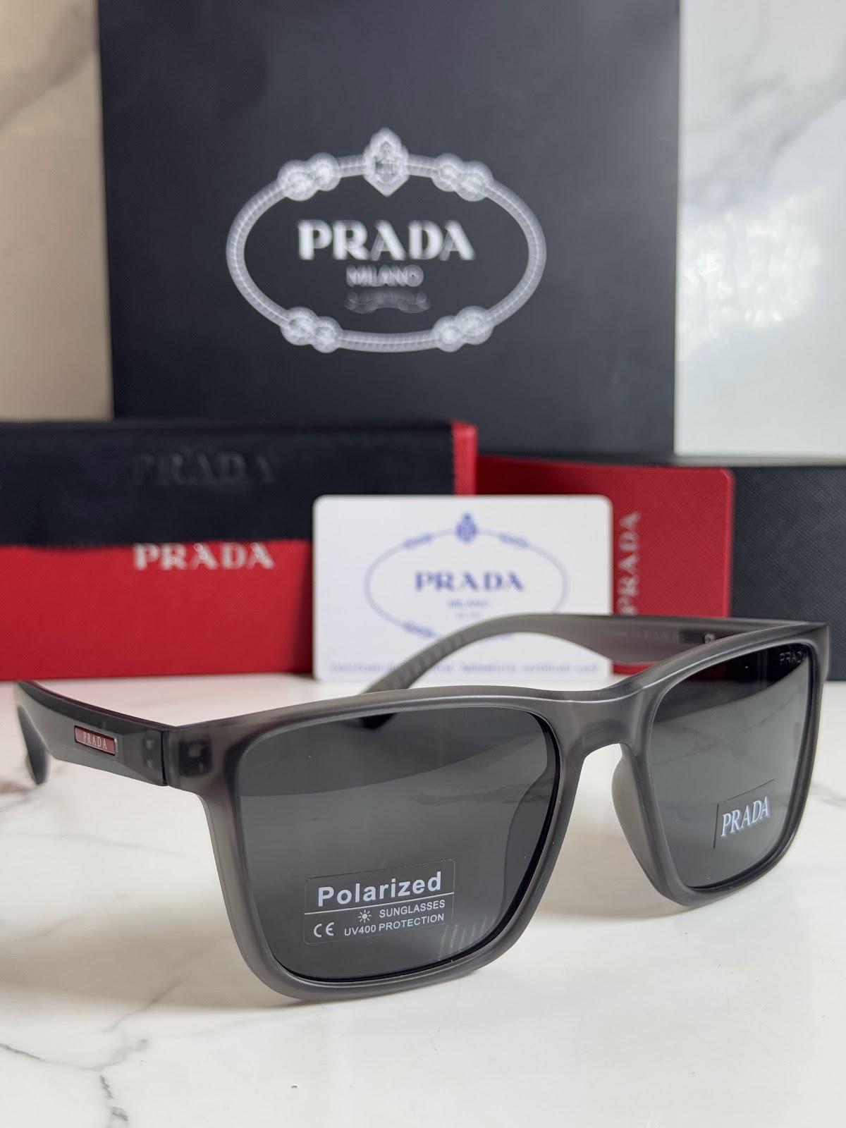 Lentes PRADA — Ref. LF-L227-0116 con el packaging mostrado en la fotografía