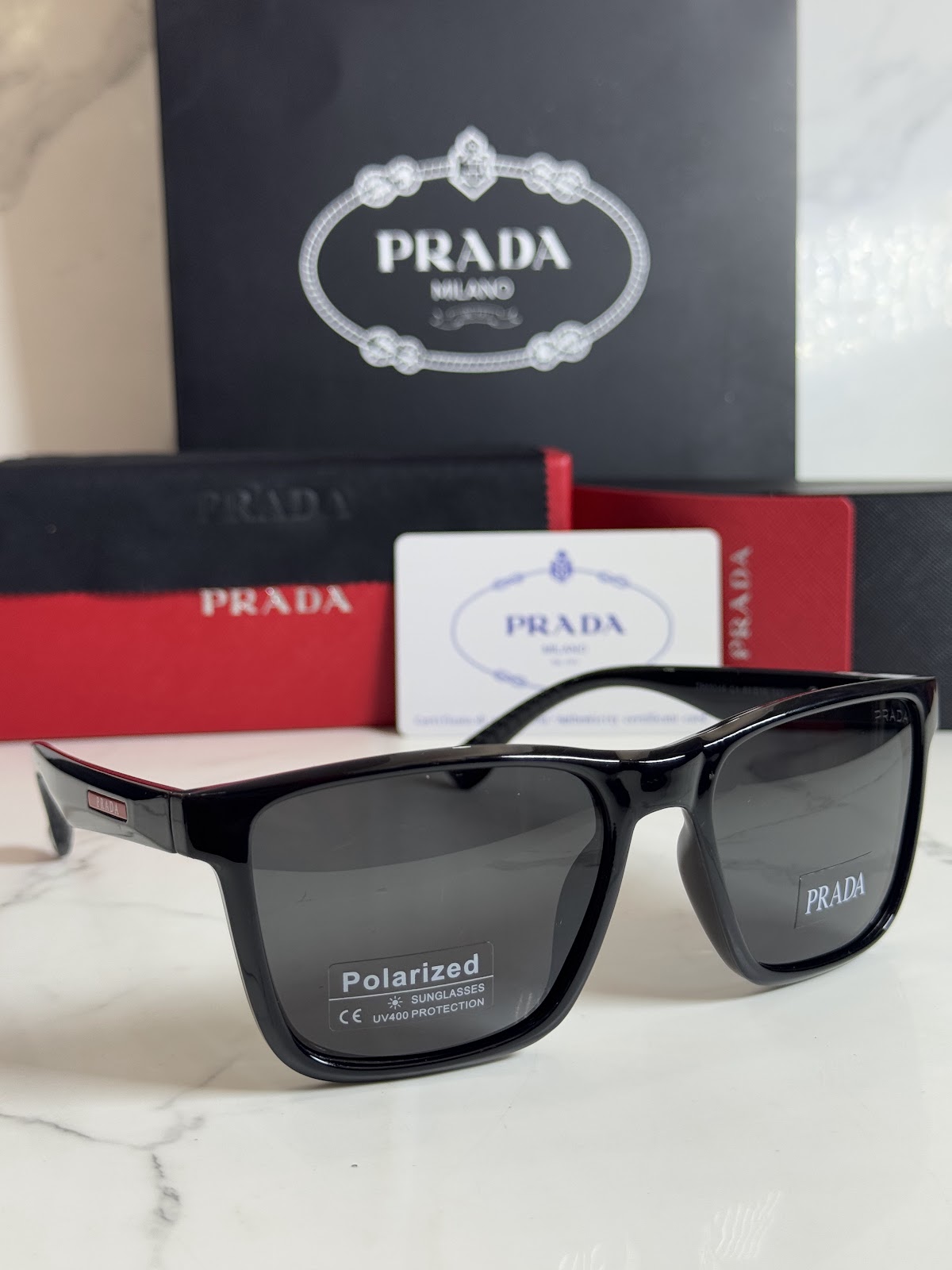 Lentes PRADA — Ref. LF-L227-0117 con el packaging mostrado en la fotografía