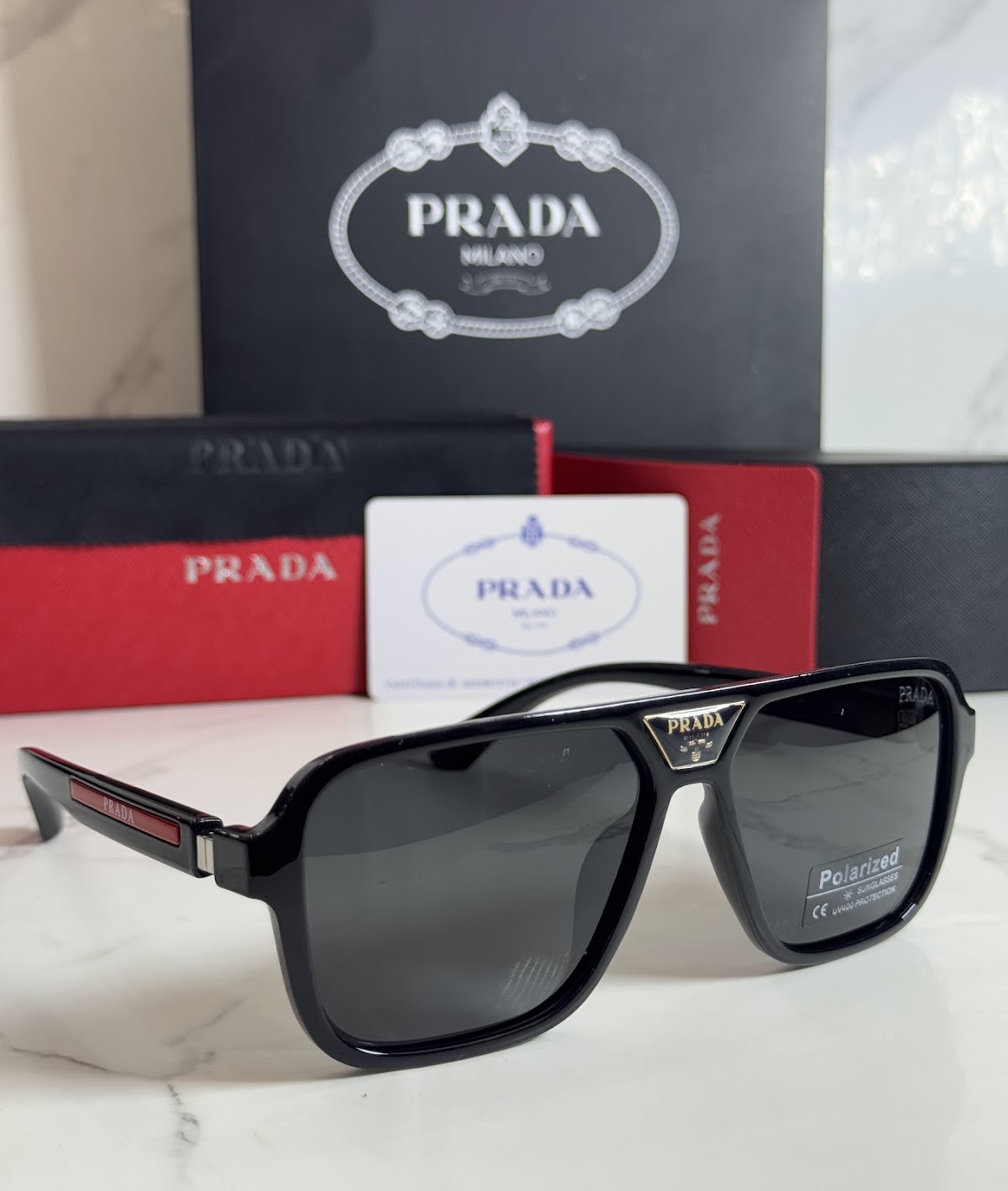 Lentes PRADA — Ref. LF-L227-0118 con el packaging mostrado en la fotografía