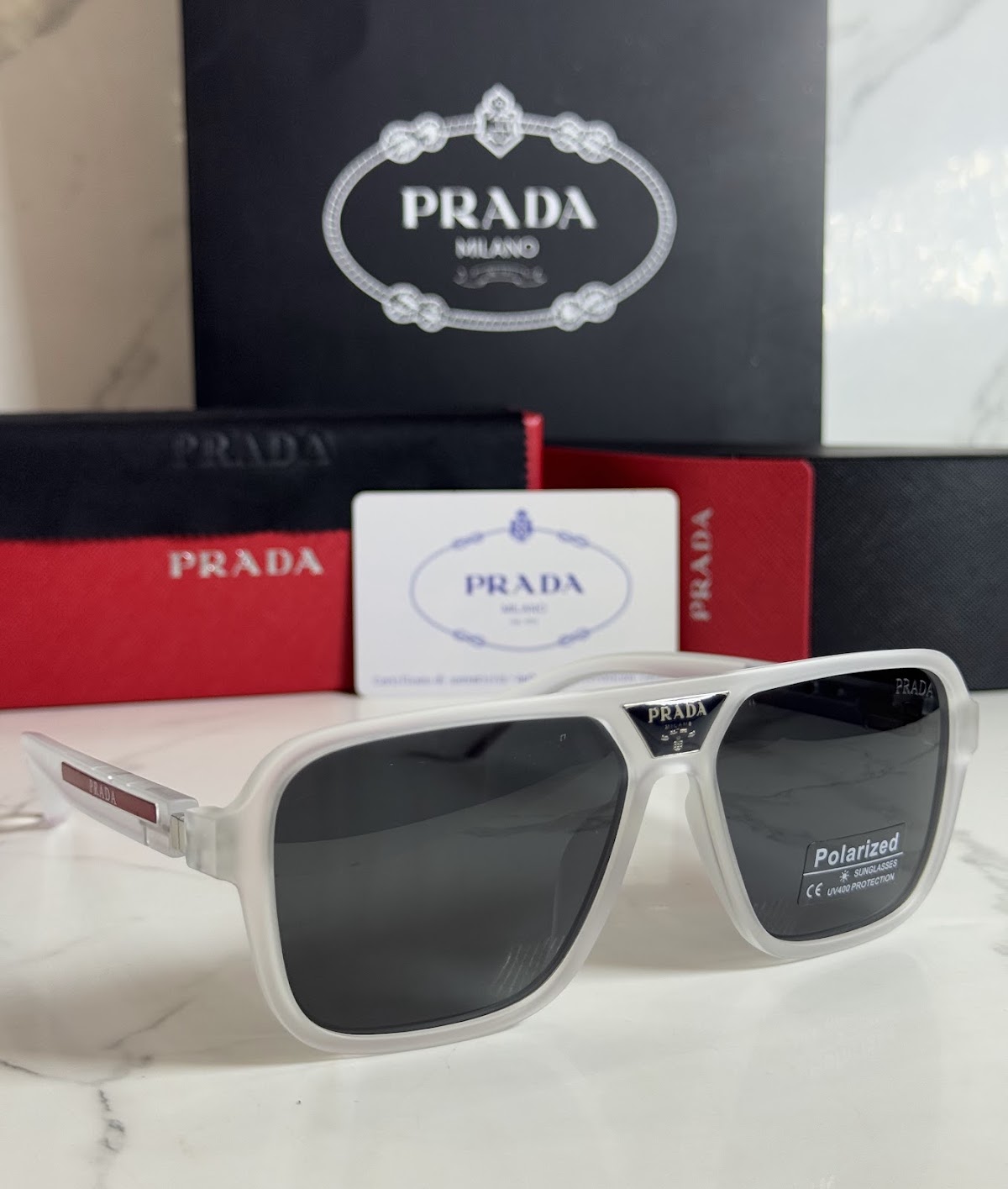Lentes PRADA — Ref. LF-L227-0119 con el packaging mostrado en la fotografía