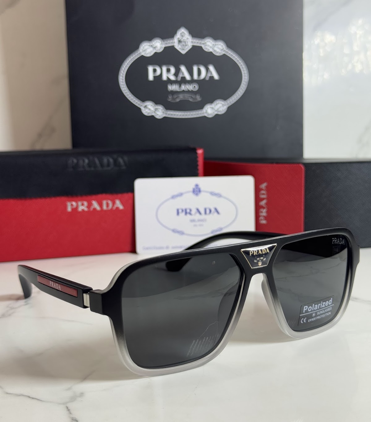 Lentes PRADA — Ref. LF-L227-0122 con el packaging mostrado en la fotografía