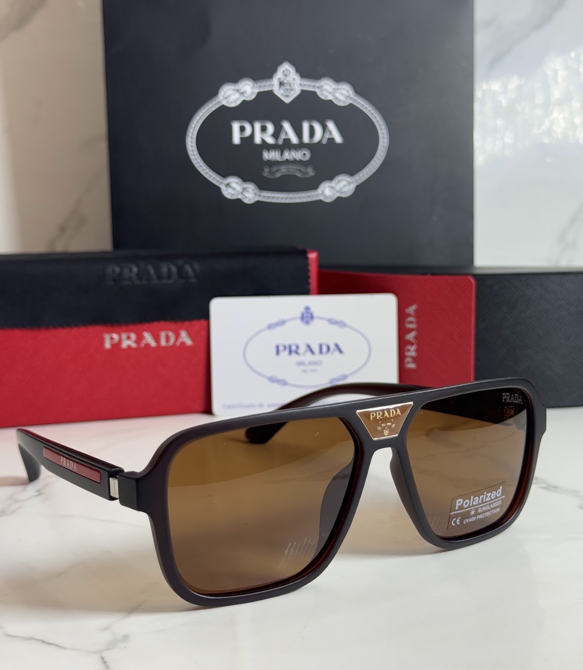 Lentes PRADA — Ref. LF-L227-0124 con el packaging mostrado en la fotografía
