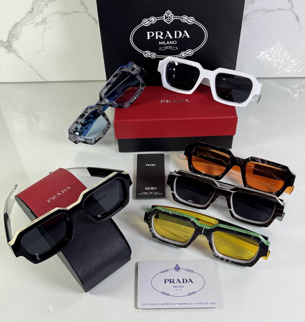 Lentes PRADA — Ref. LF-L227-0137 con el packaging mostrado en la fotografía