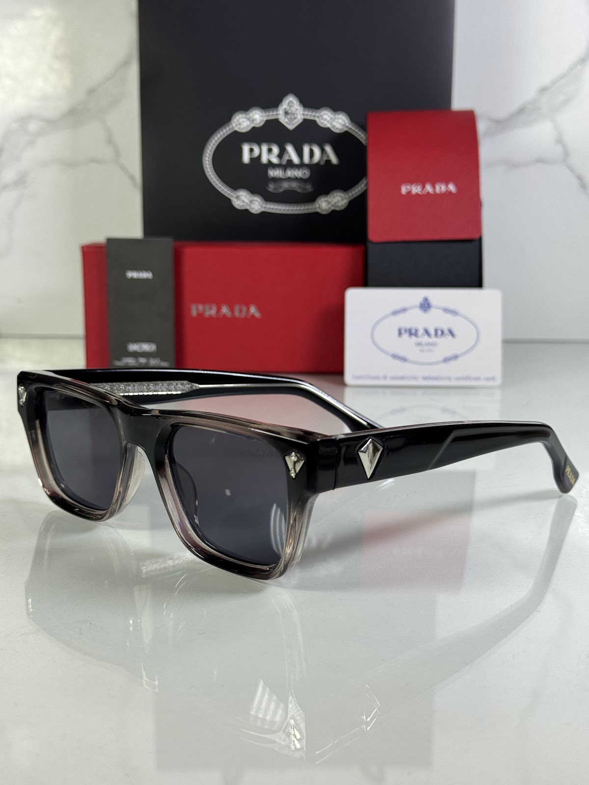 Lentes PRADA — Ref. LF-L227-0142 con el packaging mostrado en la fotografía