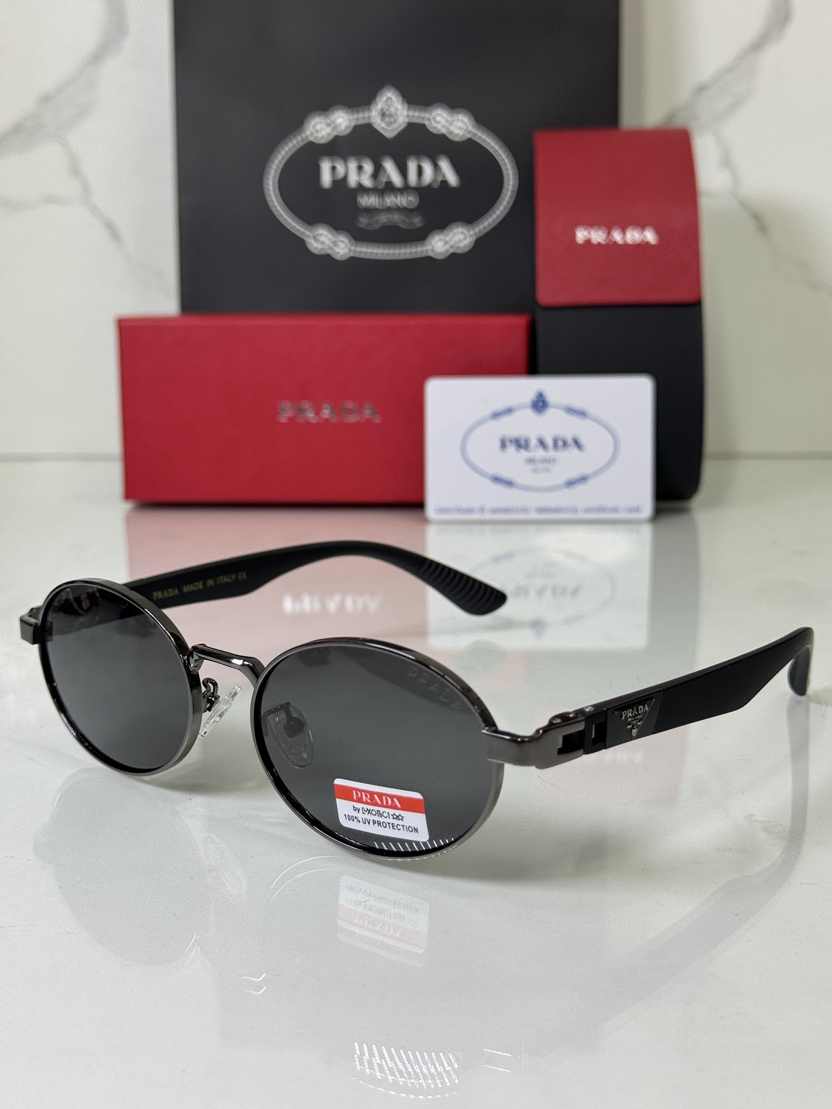 Lentes PRADA — Ref. LF-L227-0146 con el packaging mostrado en la fotografía