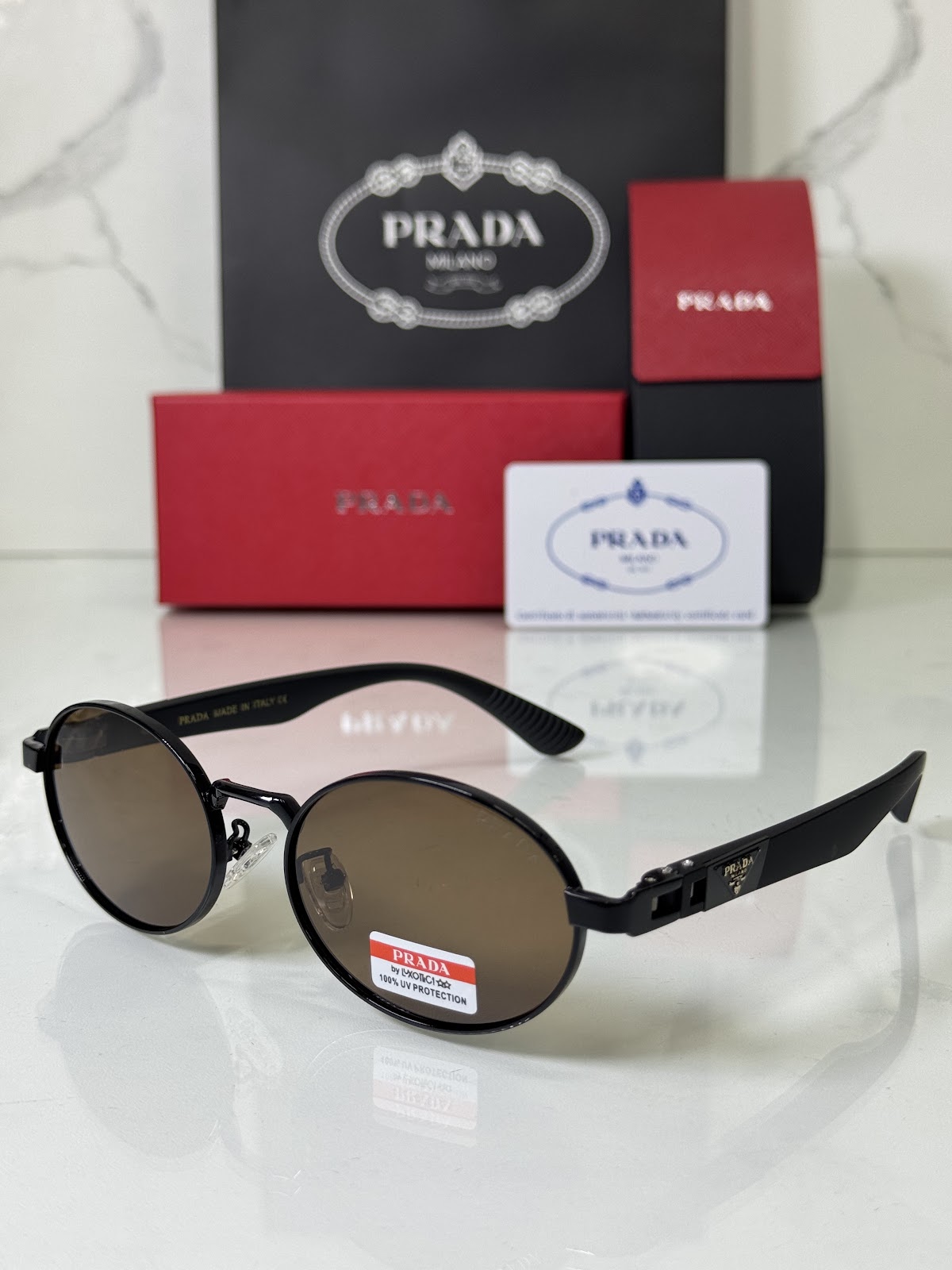 Lentes PRADA — Ref. LF-L227-0148 con el packaging mostrado en la fotografía