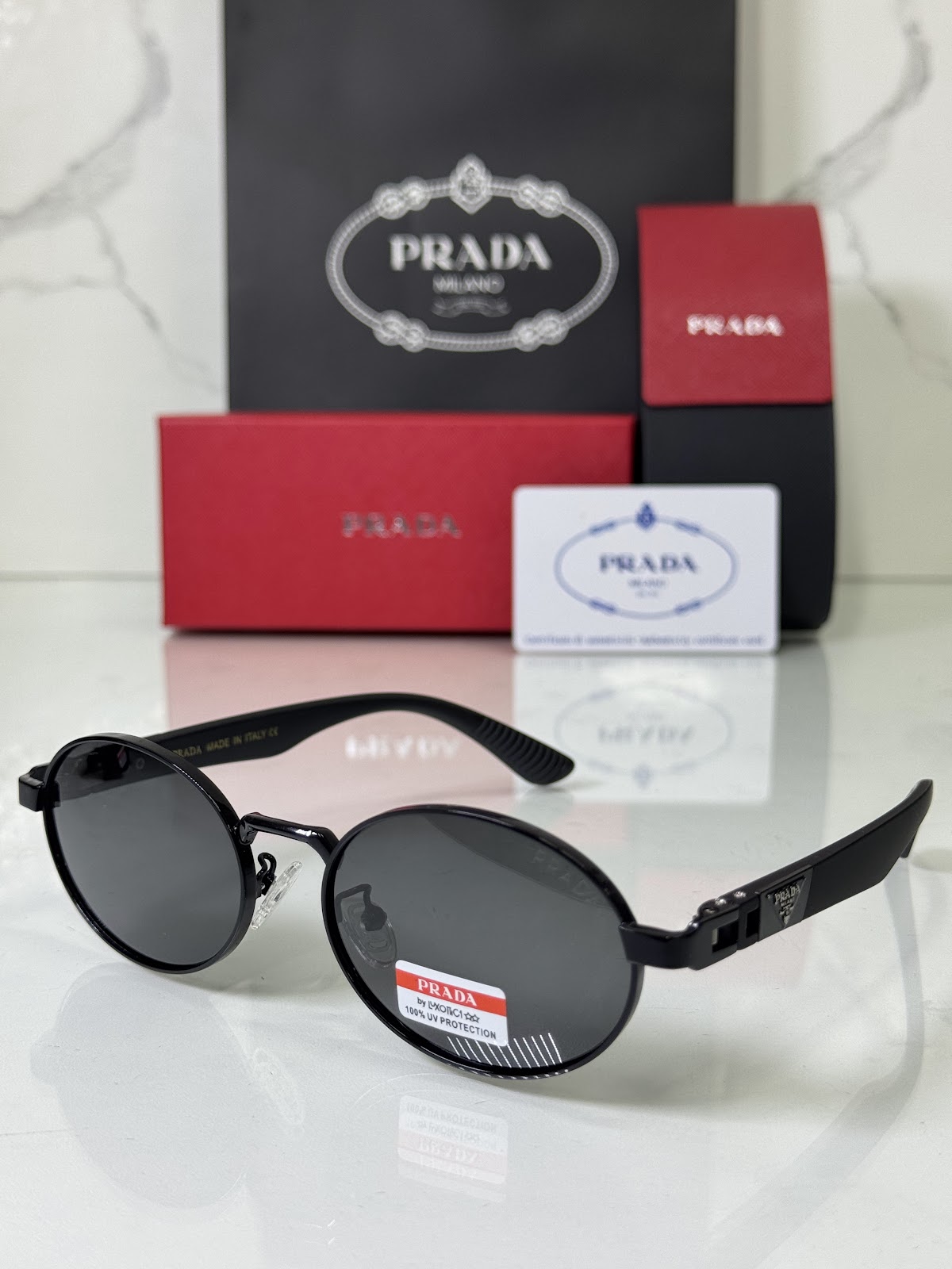 Lentes PRADA — Ref. LF-L227-0149 con el packaging mostrado en la fotografía