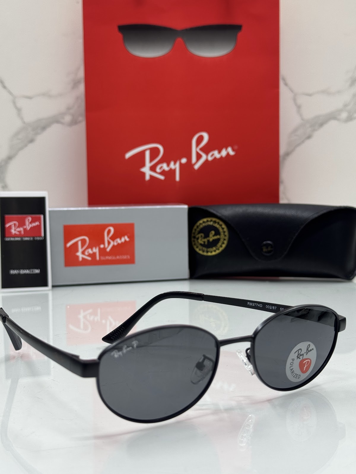 Lentes RAY-BAN — Ref. LF-L217-0159 con el packaging mostrado en la fotografía