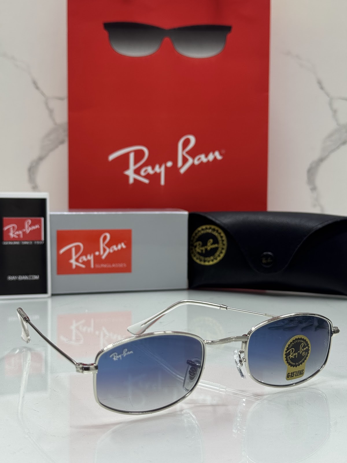 Lentes RAY-BAN — Ref. LF-L217-0160 con el packaging mostrado en la fotografía