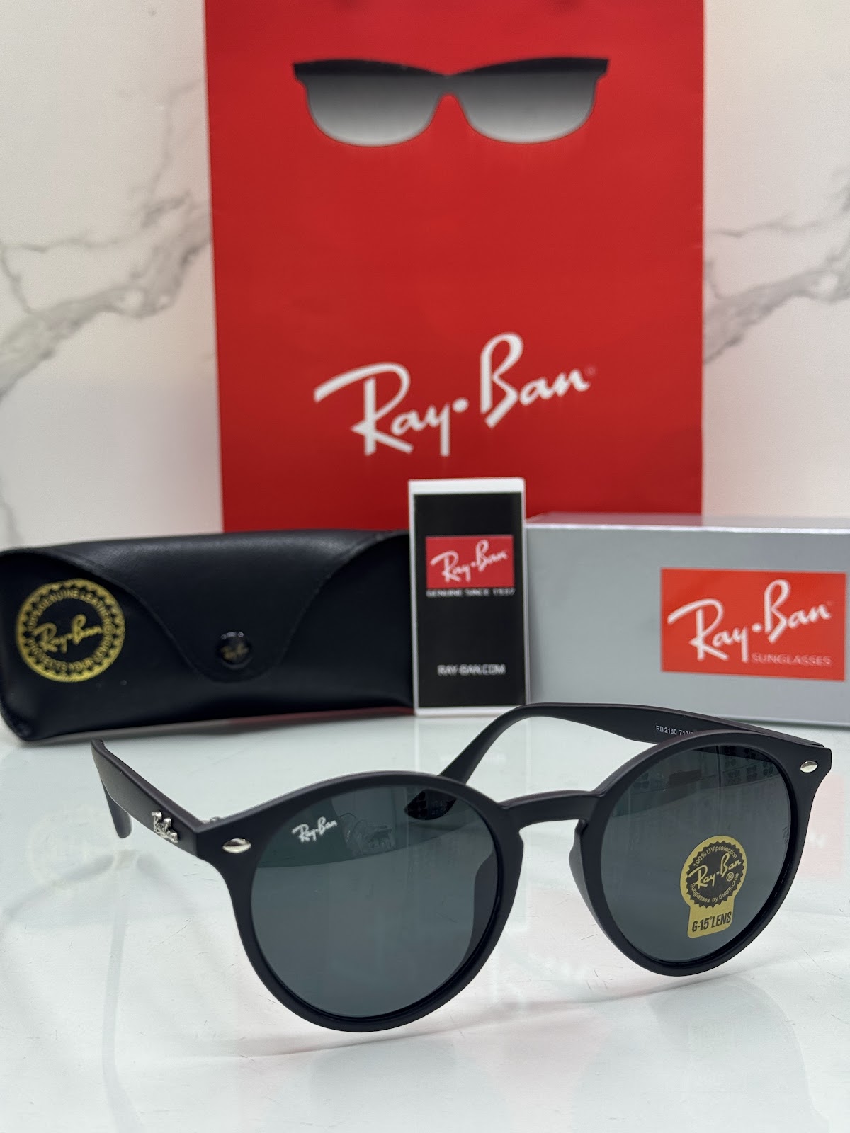 Lentes RAY-BAN — Ref. LF-L217-0238 con el packaging mostrado en la fotografía
