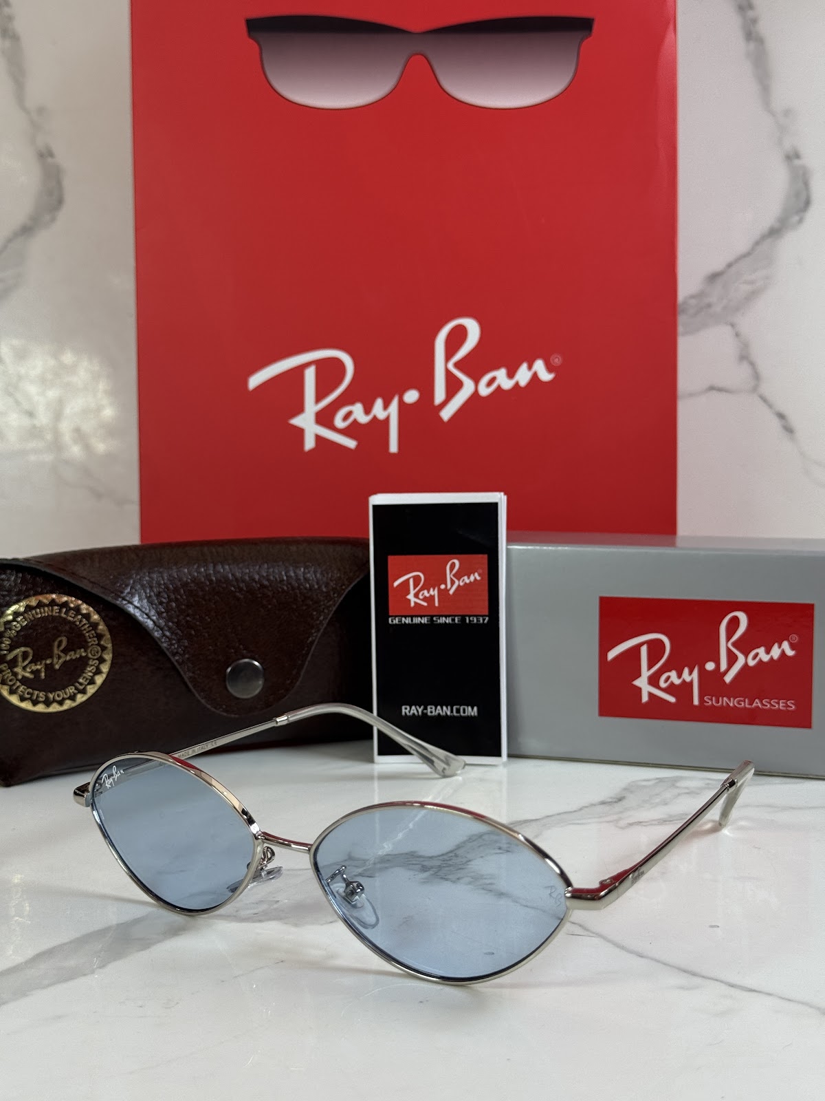 Lentes RAY-BAN — Ref. LF-L217-0330 con el packaging mostrado en la fotografía