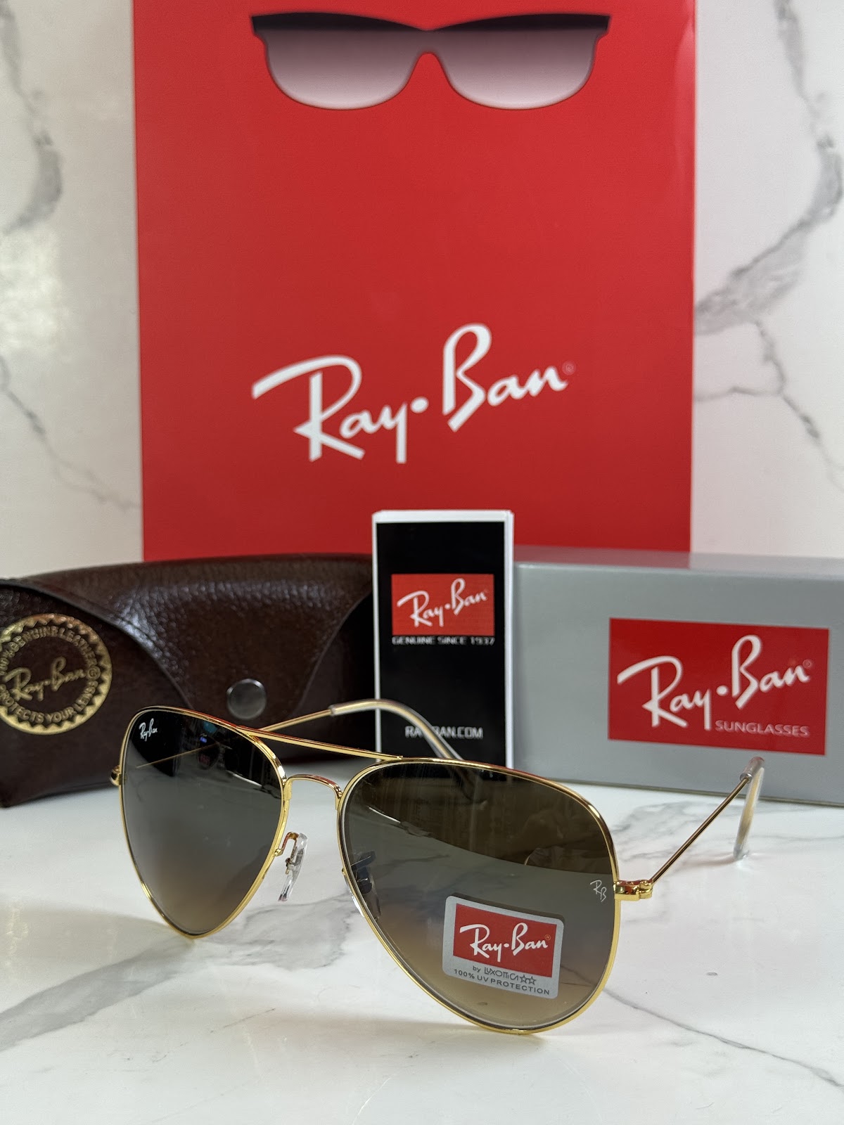 Lentes RAY-BAN — Ref. LF-L217-0336 con el packaging mostrado en la fotografía