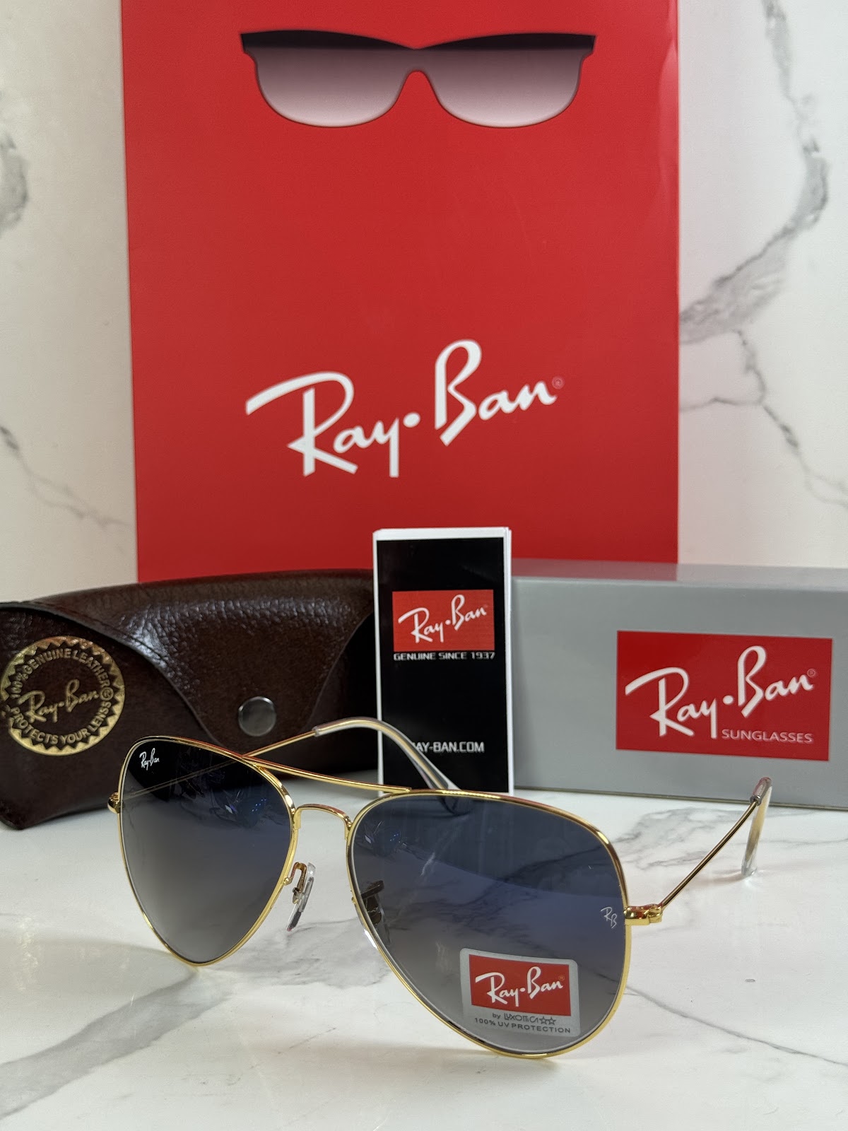 Lentes RAY-BAN — Ref. LF-L217-0340 con el packaging mostrado en la fotografía