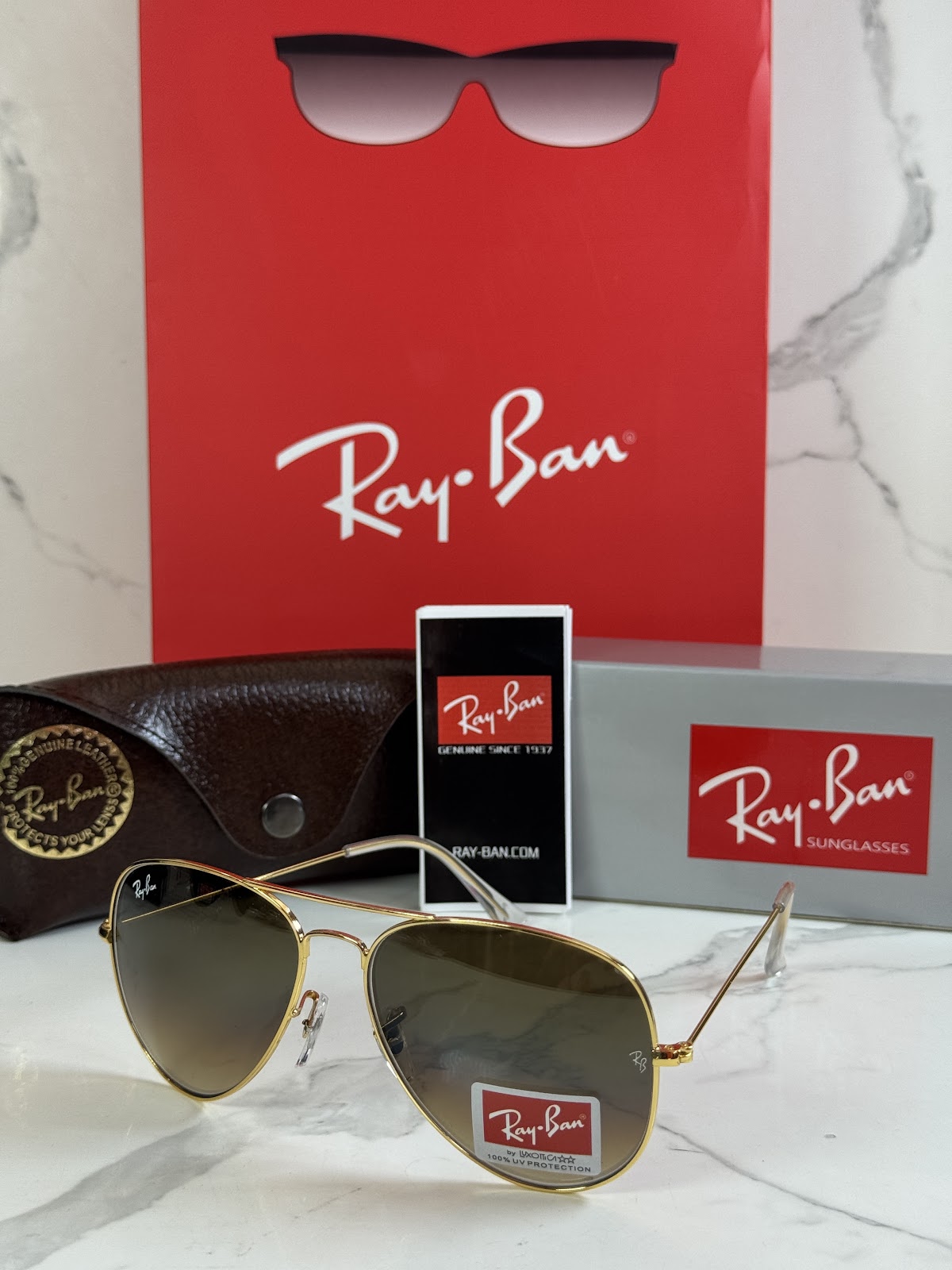 Lentes RAY-BAN — Ref. LF-L217-0342 con el packaging mostrado en la fotografía