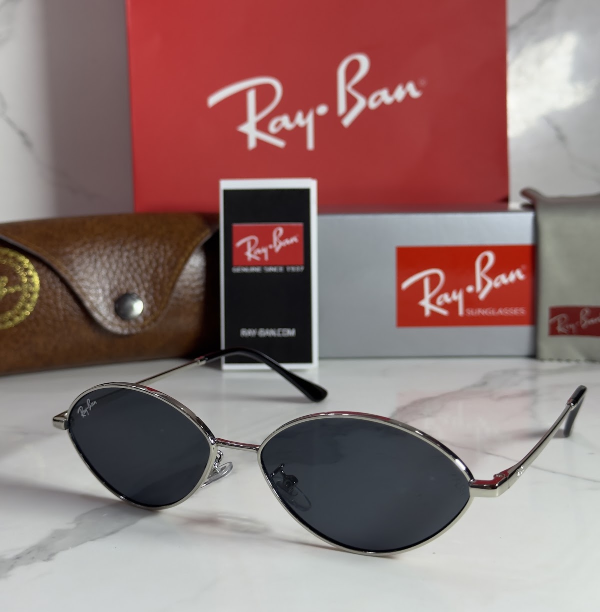 Lentes RAY-BAN — Ref. LF-L217-0549 con el packaging mostrado en la fotografía