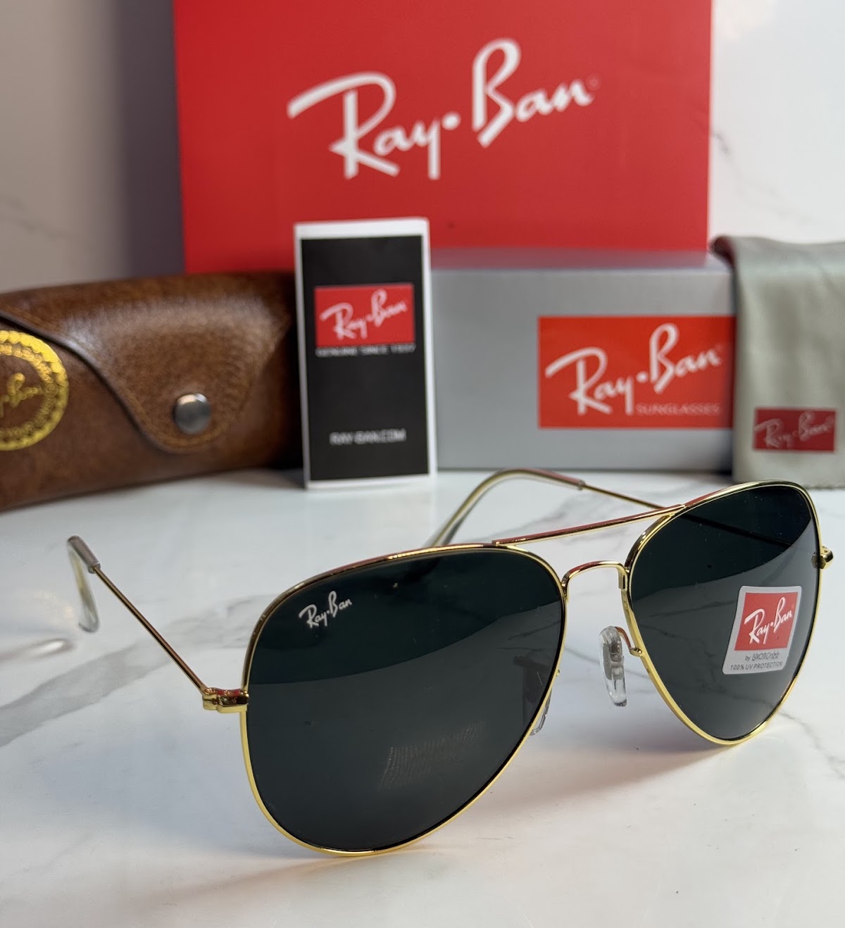 Lentes RAY-BAN — Ref. LF-L217-0618 con el packaging mostrado en la fotografía