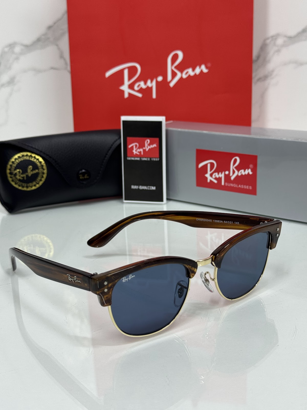 Lentes RAY-BAN — Ref. LF-L217-0669 con el packaging mostrado en la fotografía