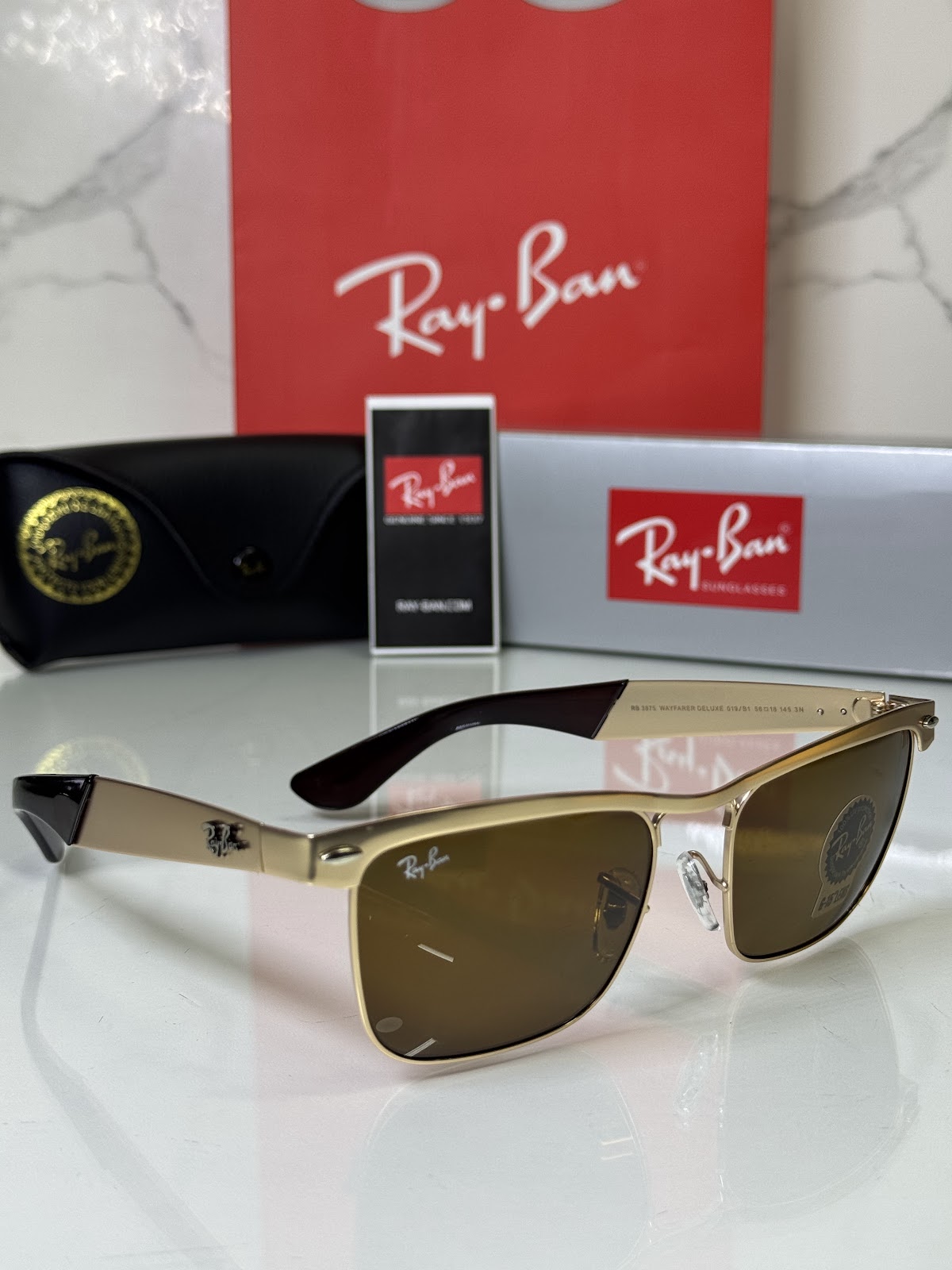Lentes RAY-BAN — Ref. LF-L217-0680 con el packaging mostrado en la fotografía