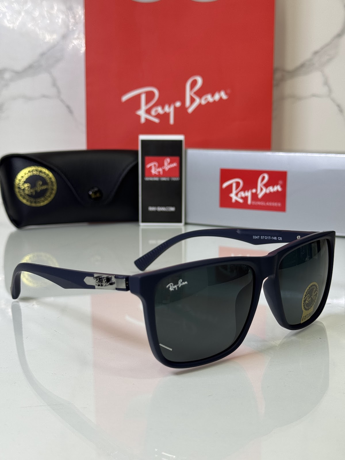Lentes RAY-BAN — Ref. LF-L217-0696 con el packaging mostrado en la fotografía