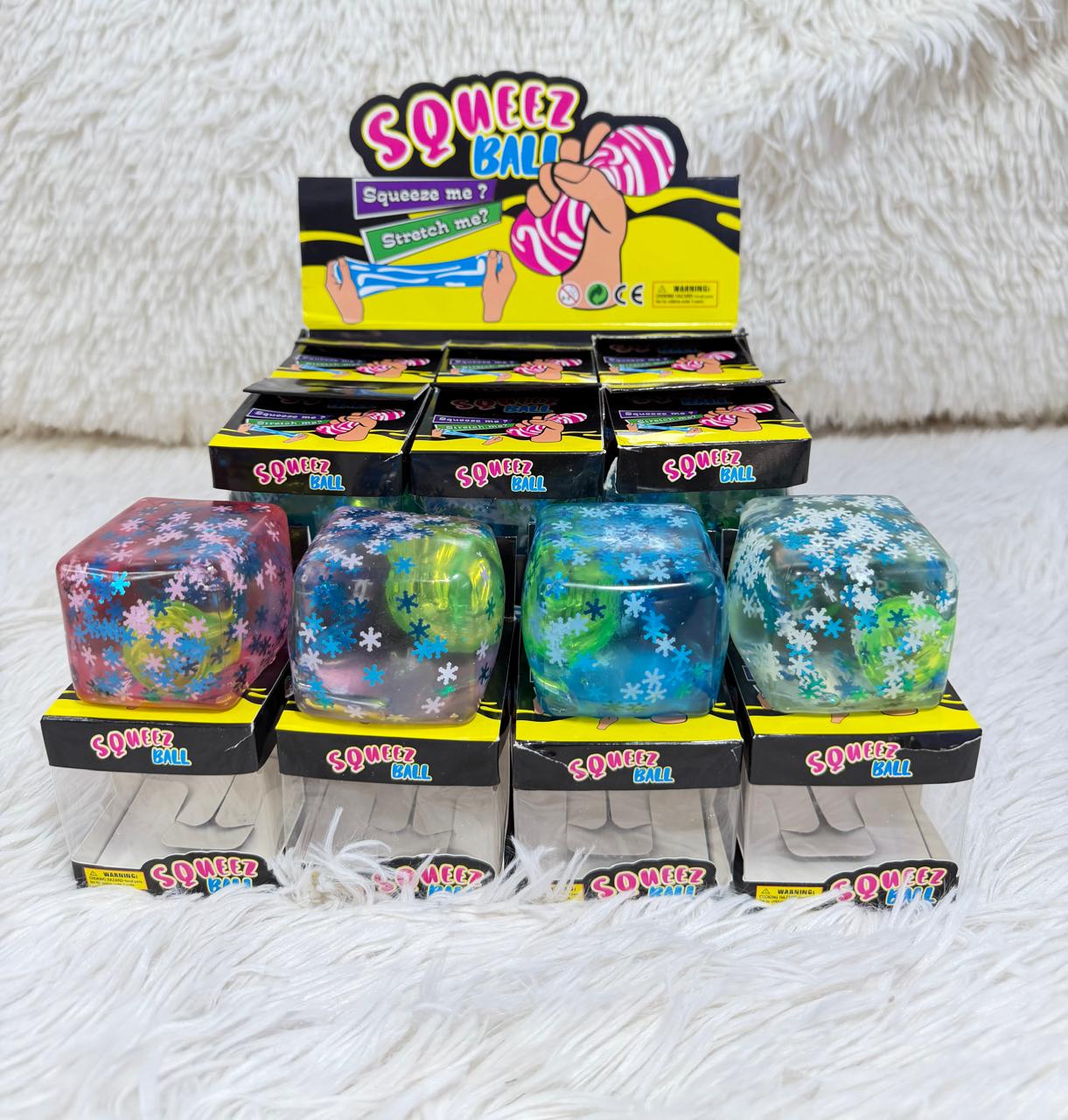 Juguete antiestrés squishy cubo con copos de nieve y luz x12